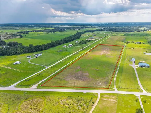 a view of an outdoor space and tennis court