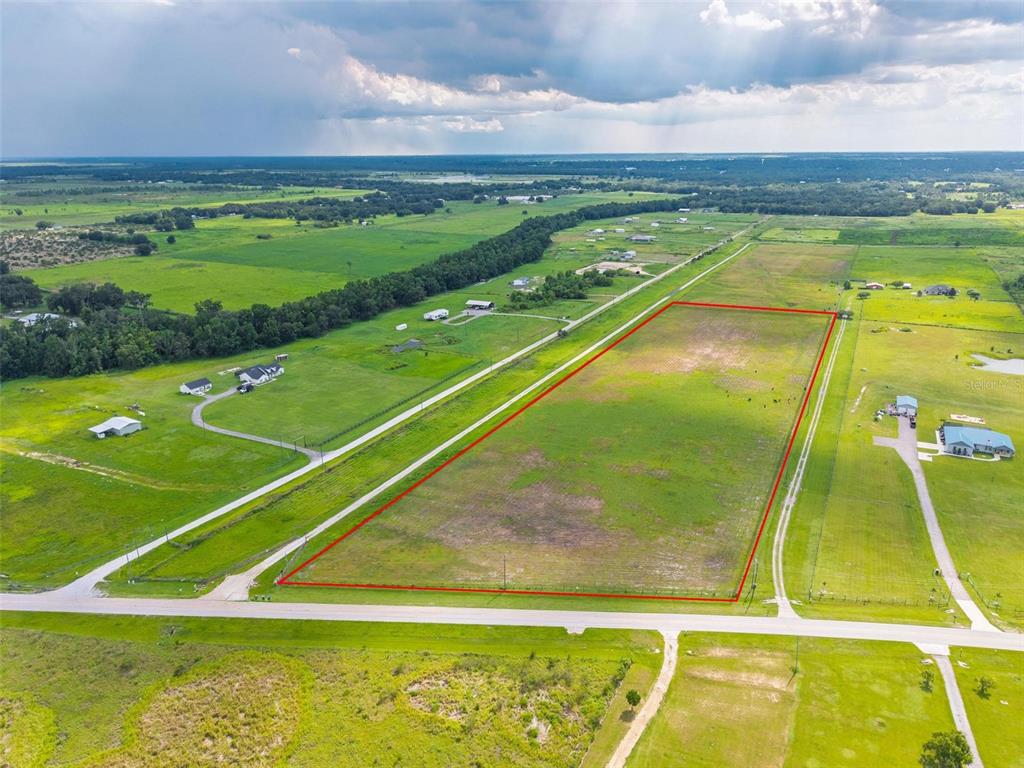 903 Brook Road North Fort Meade, FL 33841 - Photo 3 of 17 a view of an outdoor space and tennis court