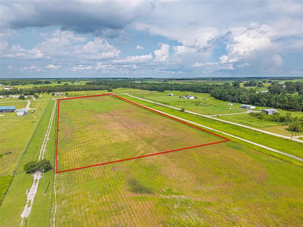 903 Brook Road North Fort Meade, FL 33841 - Photo 9 of 17 a view of a swimming pool and an outdoor seating