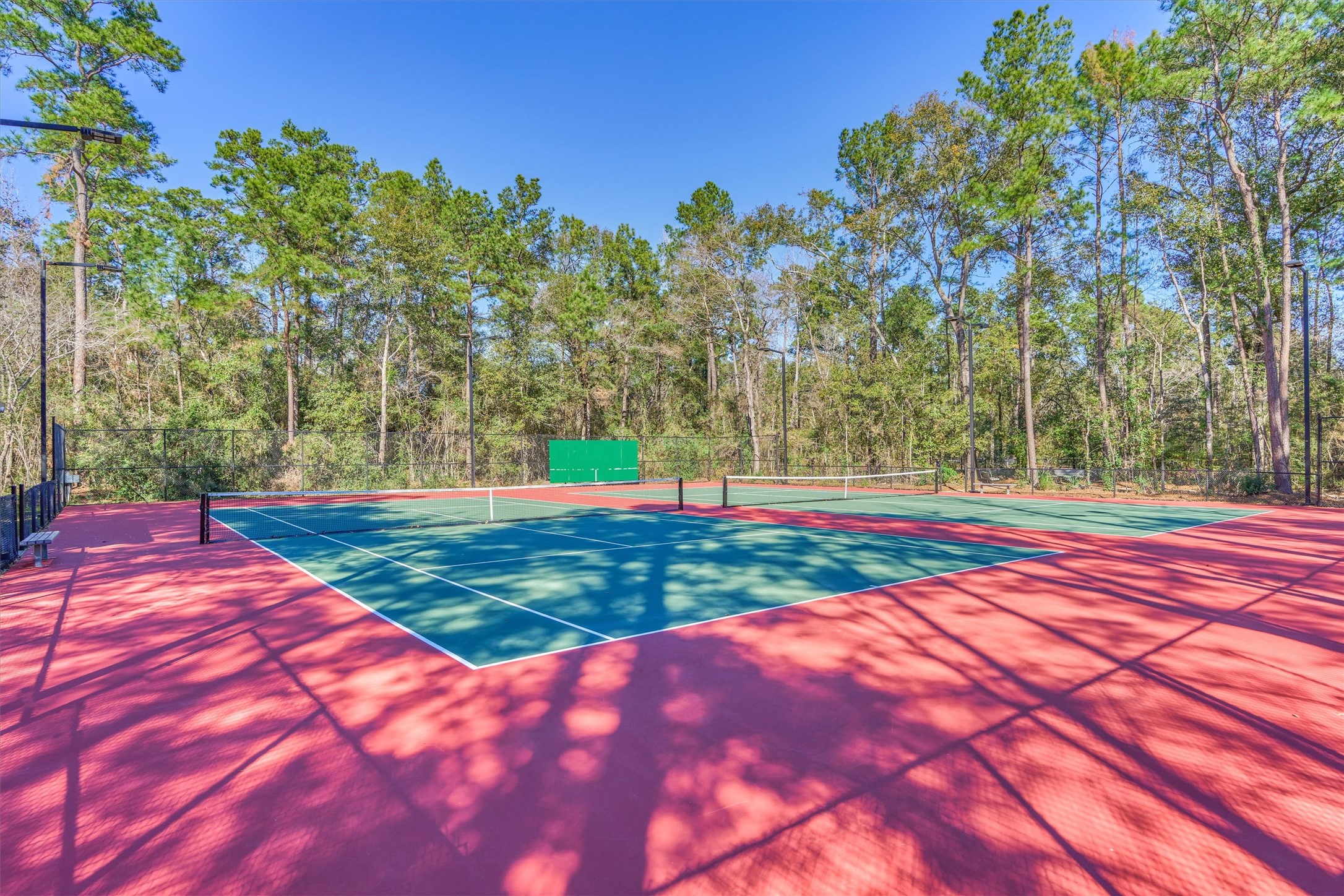 23 Ripple Rush Court The Woodlands, TX 77381 - Photo 17 of 32 Local area tennis courts!