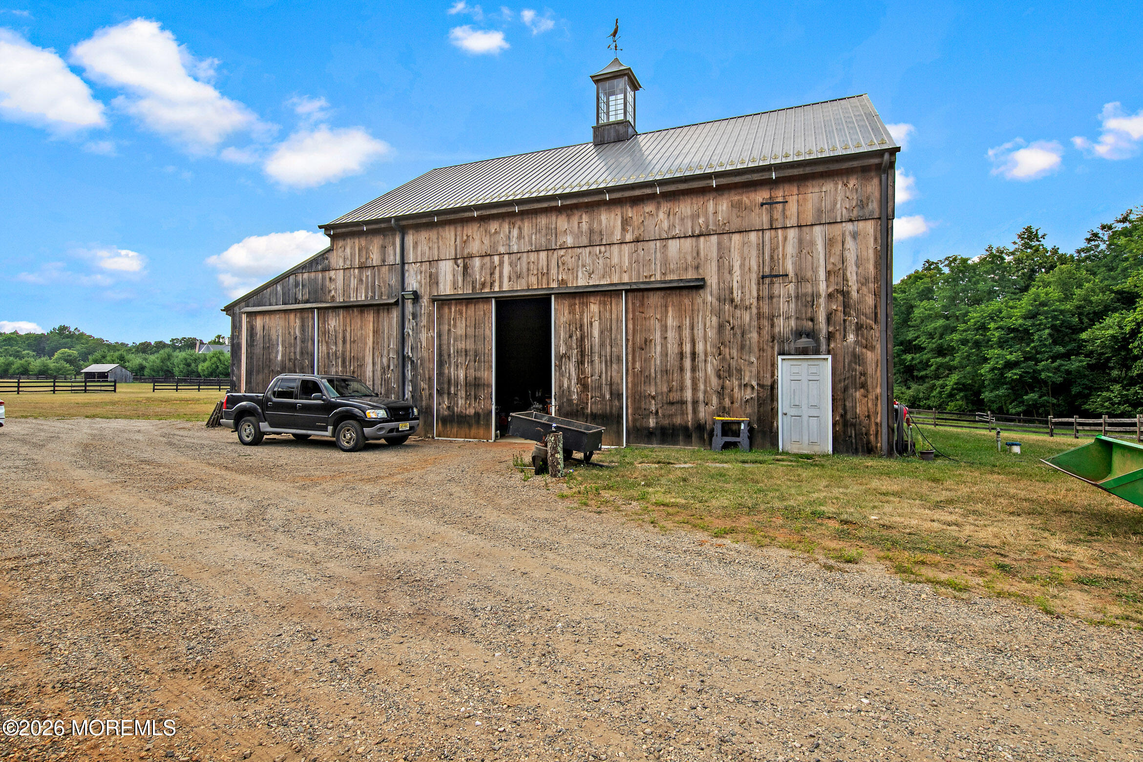 88 Montrose Road Colts Neck, NJ 07722 - Photo 65 of 73 a view of a house with backyard and garden