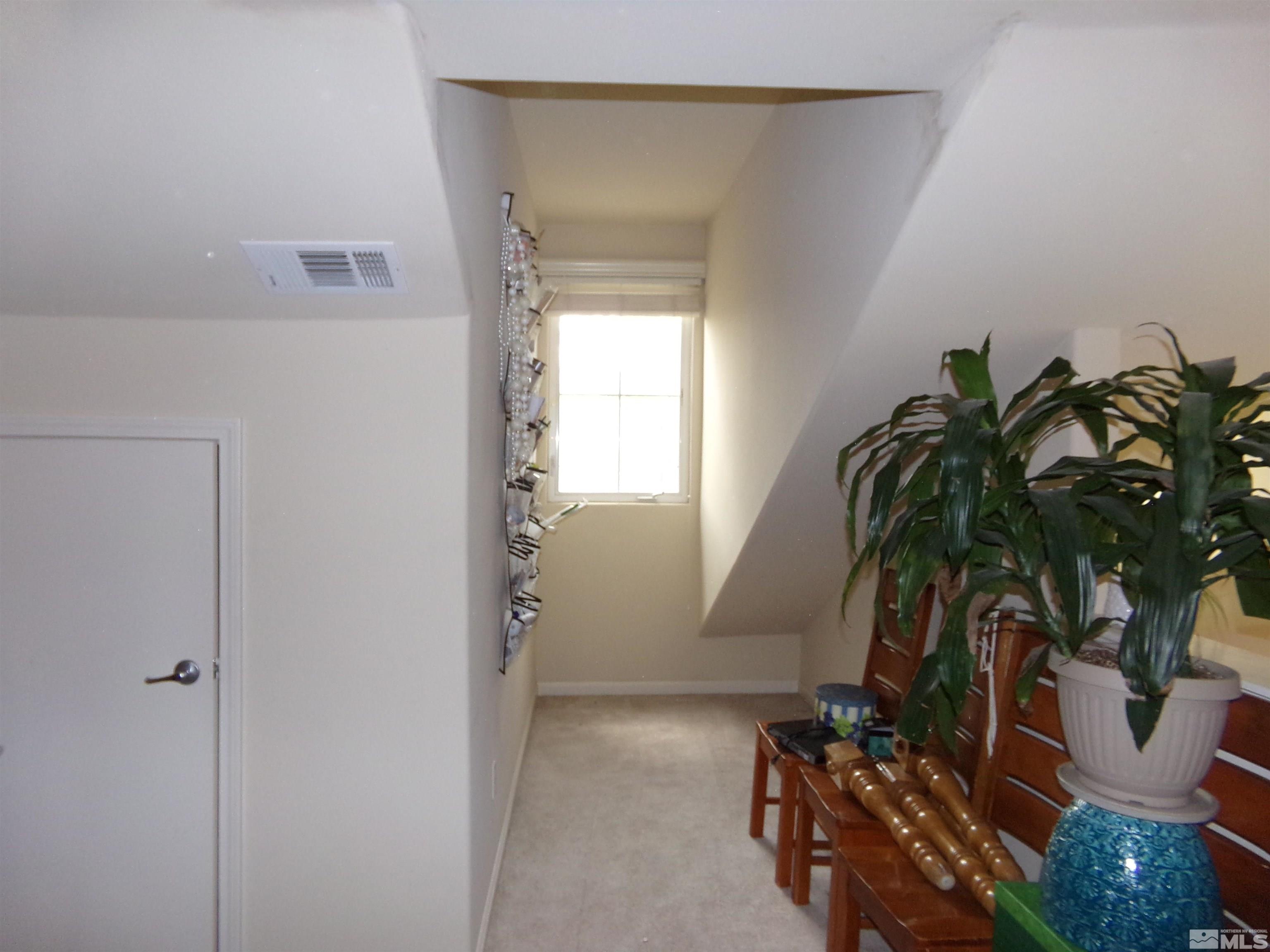 9050 Double R Boulevard, Unit 1124 Reno, NV 89521 - Photo 36 of 40 a view of backyard and dining room