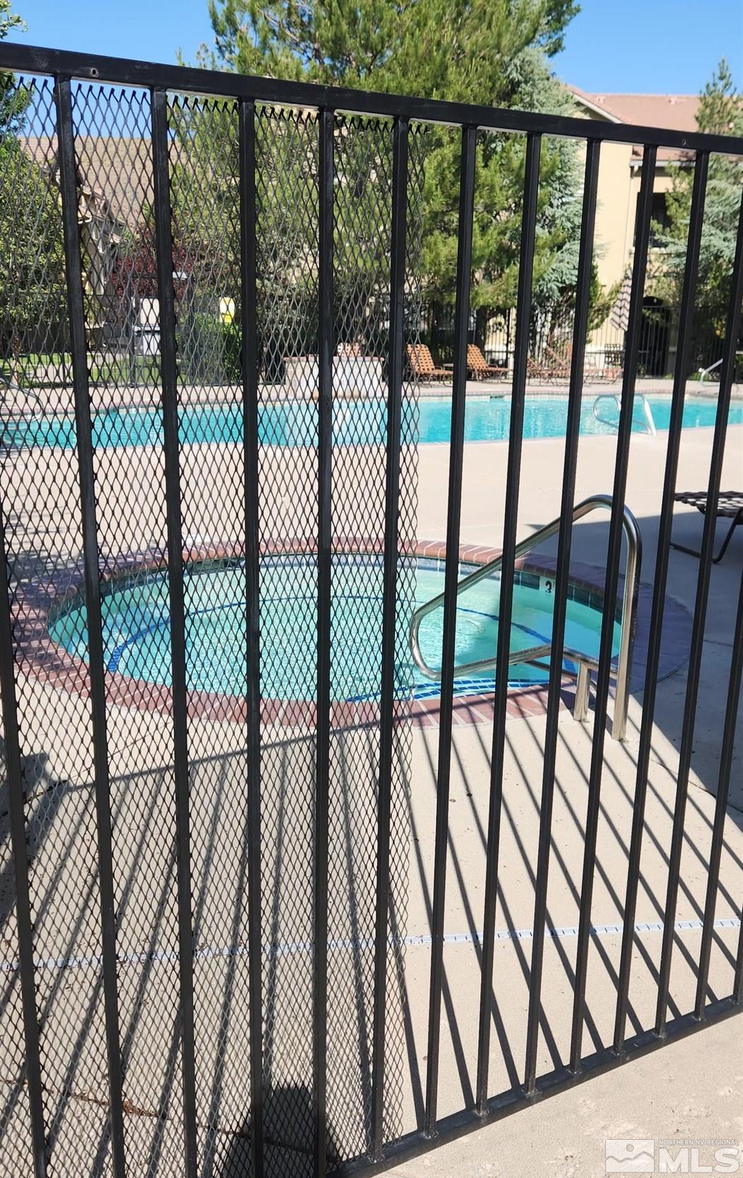 9050 Double R Boulevard, Unit 1124 Reno, NV 89521 - Photo 37 of 40 swimming pool view from balcony