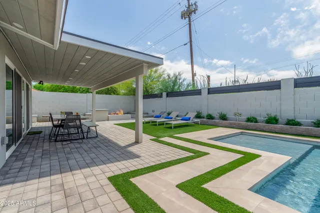 a view of a house with a swimming pool