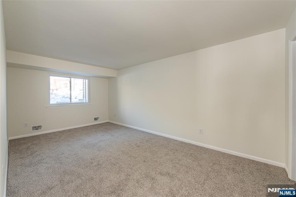 7 Summit Court Annandale, NJ 08801 - Photo 17 of 21 a view of an empty room and a window