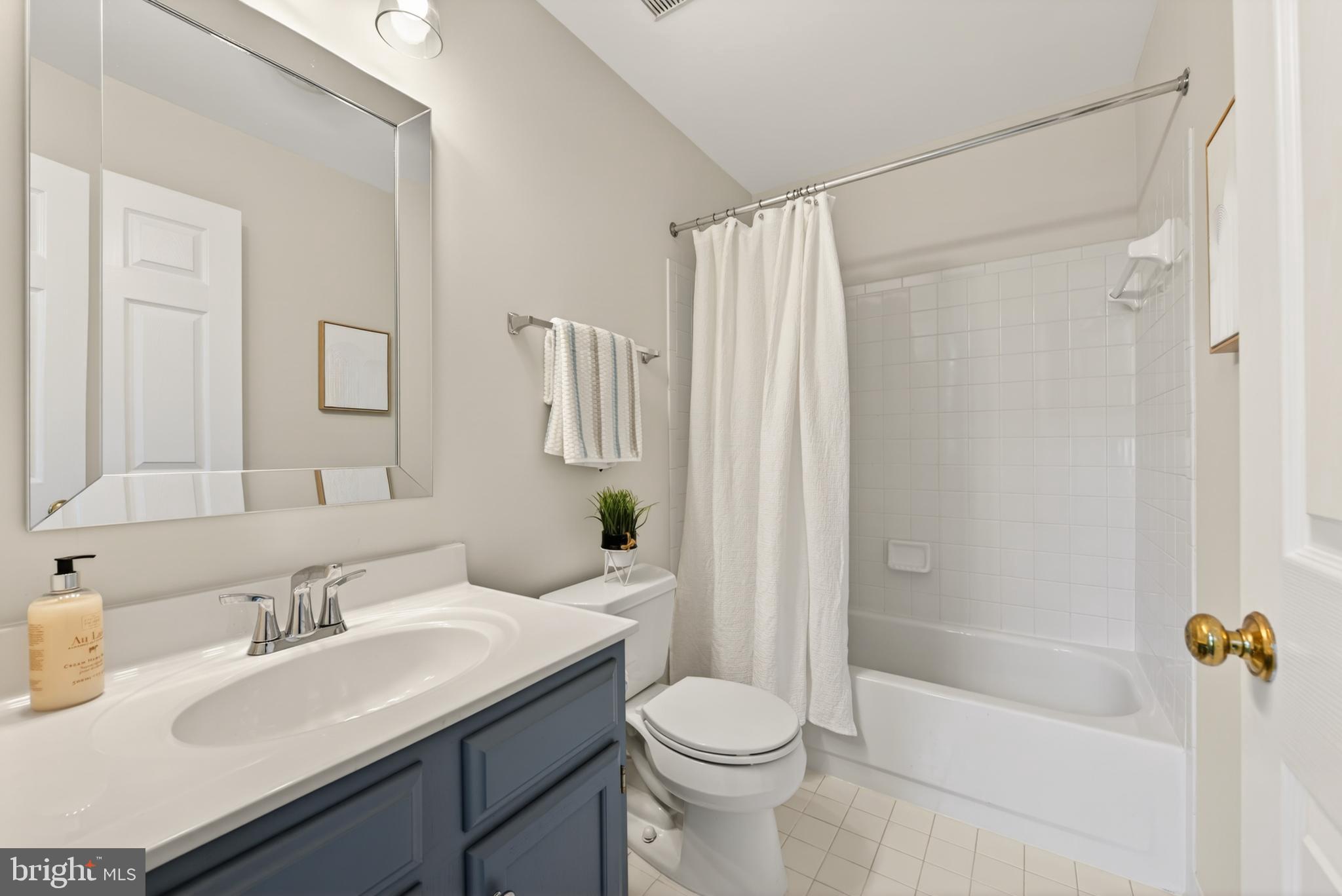 1409 Park Garden Lane Reston, VA 20194 - Photo 28 of 41 a bathroom with a sink toilet and shower