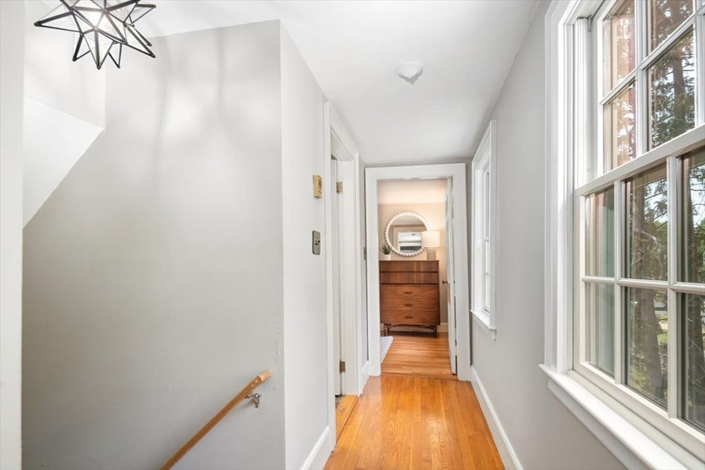 8 Merrymount Road Hingham, MA 02043 - Photo 21 of 34 a view of a hallway with a wooden door