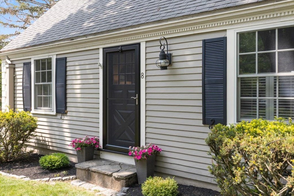 8 Merrymount Road Hingham, MA 02043 - Photo 3 of 34 a potted plant sitting in front of a house