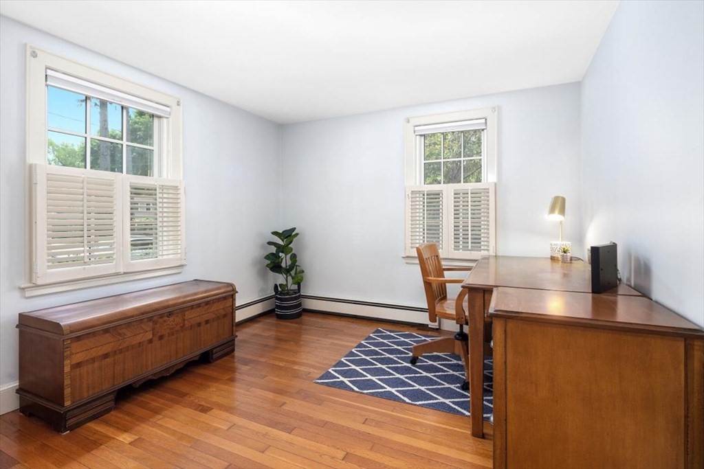 8 Merrymount Road Hingham, MA 02043 - Photo 8 of 34 a living room with furniture and a window