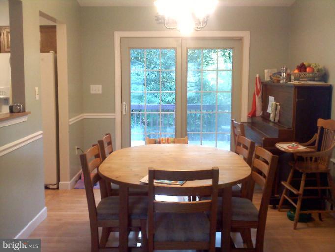 425 Rachaels Way Prince Frederick, MD 20678 - Photo 4 of 5 a view of a dining room with furniture window and outside view