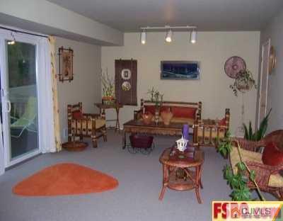 54 Ridge Road Edison, NJ 08817 - Photo 4 of 6 a living room with furniture and a rug