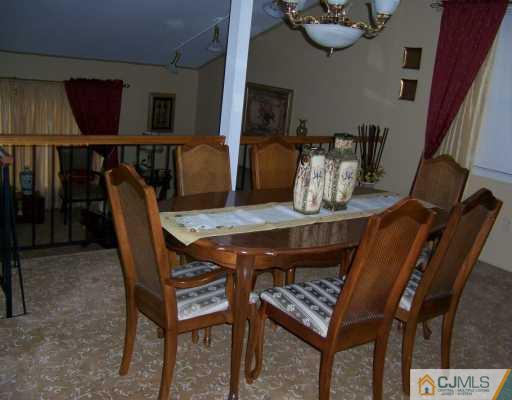 54 Ridge Road Edison, NJ 08817 - Photo 5 of 6 a view of a dining room with furniture