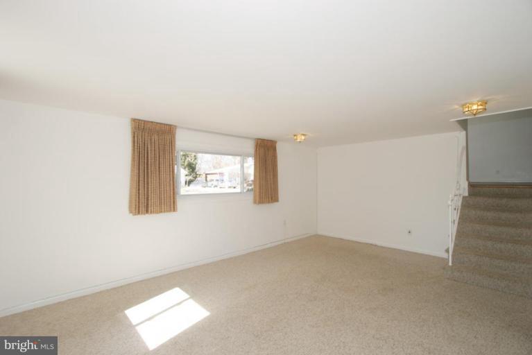 3520 Olympic Street Silver Spring, MD 20906 - Photo 14 of 24 an empty room with windows