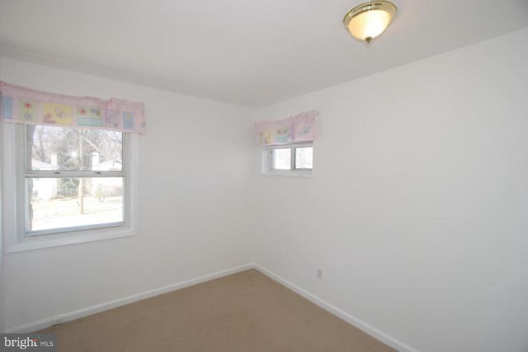 3520 Olympic Street Silver Spring, MD 20906 - Photo 5 of 24 an empty room with windows