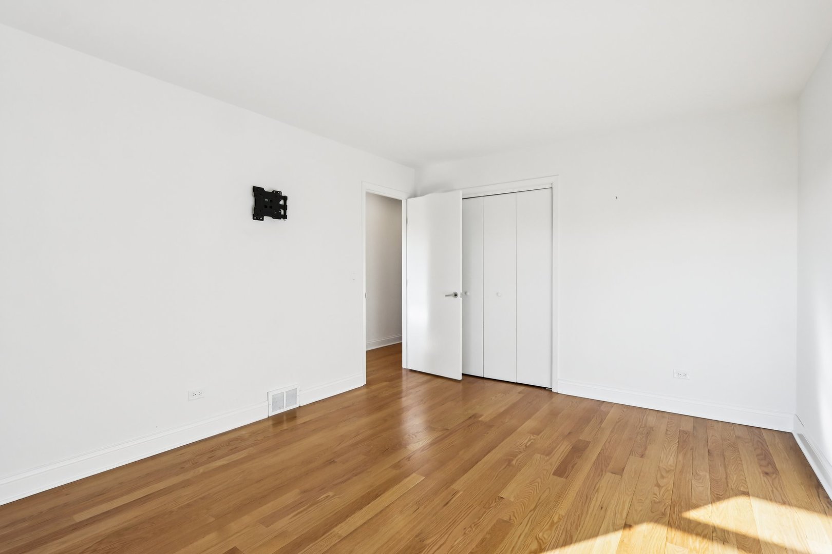 2019 East Avon Lane Arlington Heights, IL 60004 - Photo 26 of 58 a view of an empty room with wooden floor