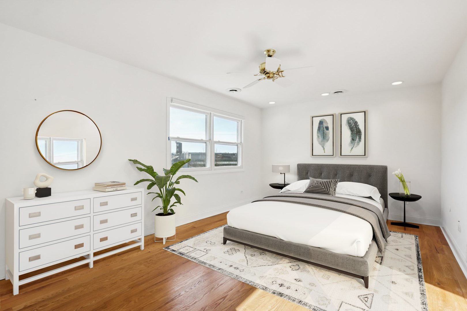 2019 East Avon Lane Arlington Heights, IL 60004 - Photo 36 of 58 a spacious bedroom with a bed a dresser and potted plants