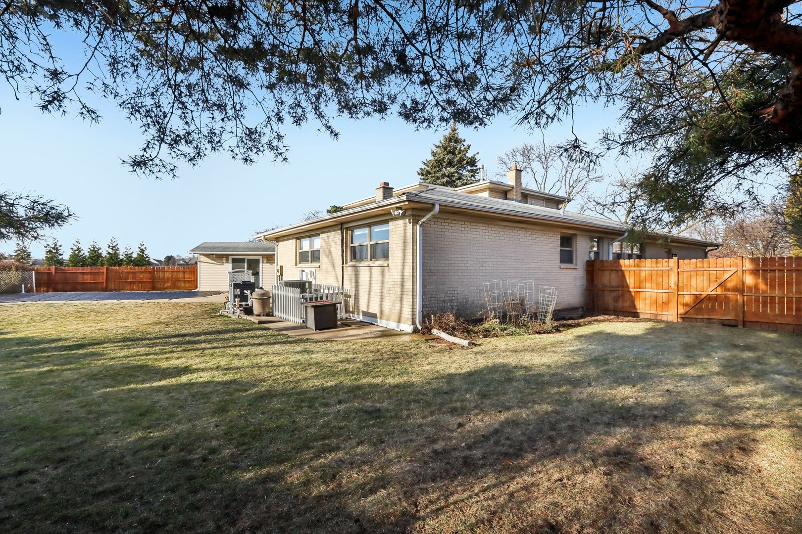 2019 East Avon Lane Arlington Heights, IL 60004 - Photo 49 of 58 a view of a house with a yard and garage
