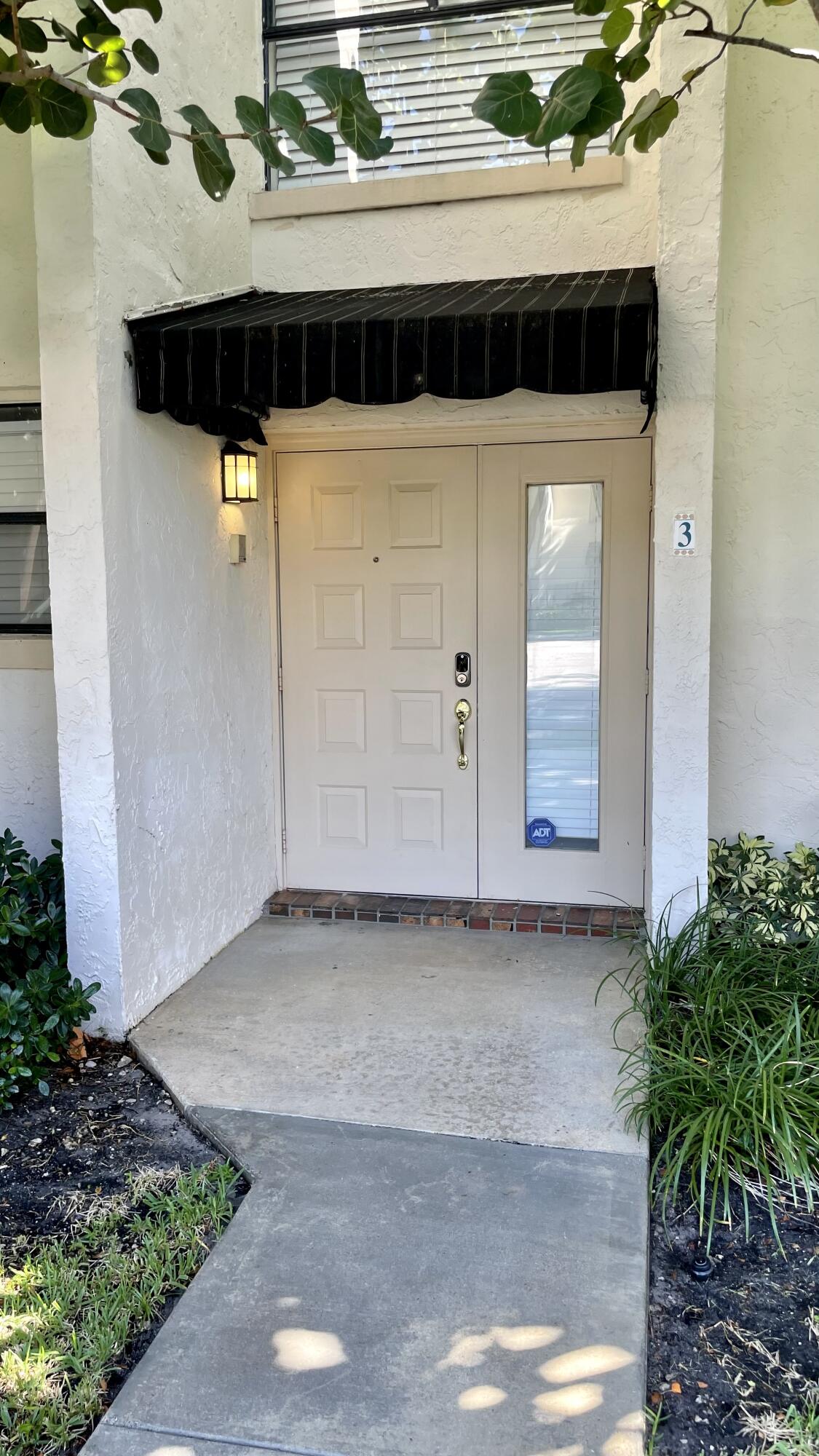 7200 Northwest 2nd Avenue, Unit 30 Boca Raton, FL 33487 - Photo 1 of 10 front door