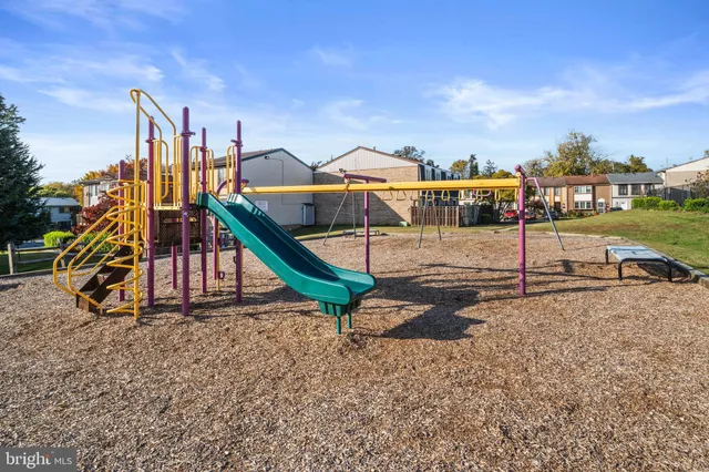a view of a house with a park