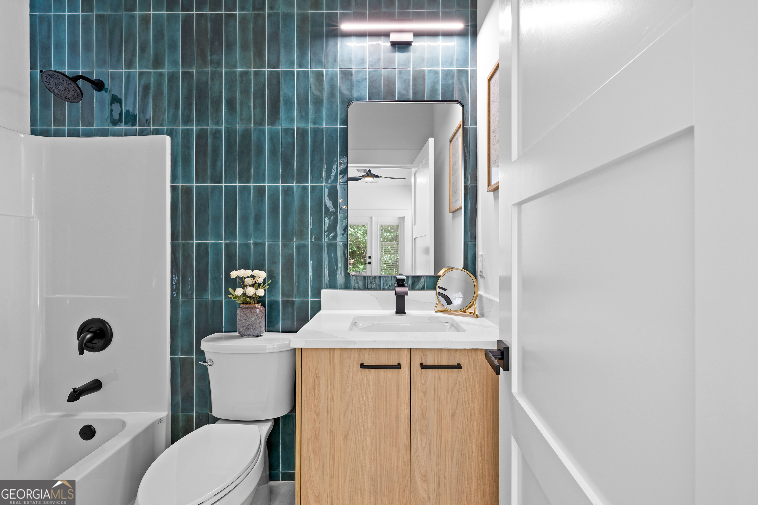 354 Turner Road Newnan, GA 30263 - Photo 54 of 79 a bathroom with a sink a toilet and shower
