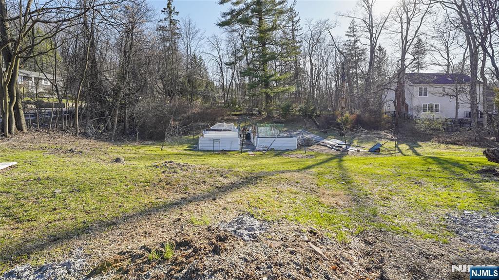 695 Ramapo Valley Road Oakland, NJ 07436 - Photo 6 of 42 a view of a swimming pool with a yard
