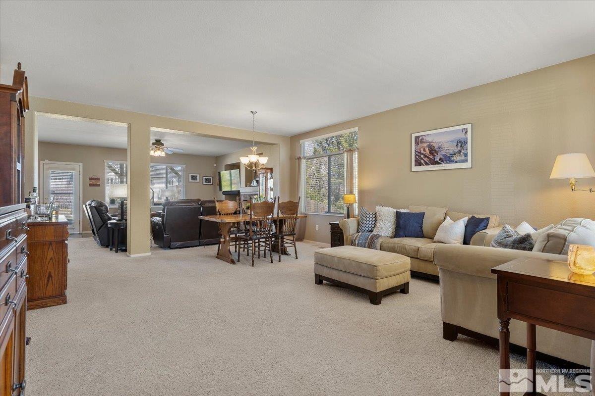 2225 Solitude Drive Reno, NV 89511 - Photo 2 of 40 a living room with furniture and a large window