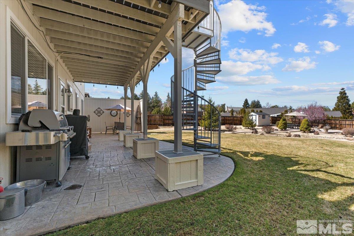2225 Solitude Drive Reno, NV 89511 - Photo 25 of 40 a view of a swimming pool with outdoor seating