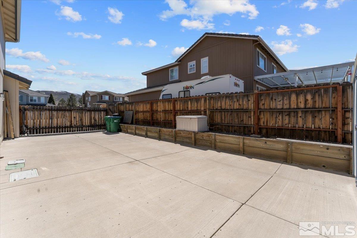 2225 Solitude Drive Reno, NV 89511 - Photo 34 of 40 a view of a house with a wooden fence