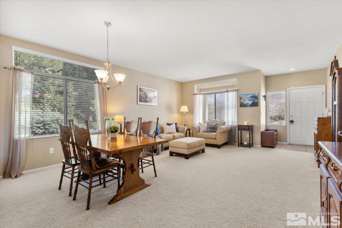 2225 Solitude Drive Reno, NV 89511 - Photo 4 of 40 a view of a livingroom with furniture and a window