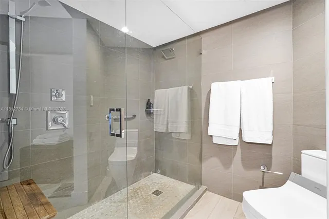 a view of a balcony with chairs