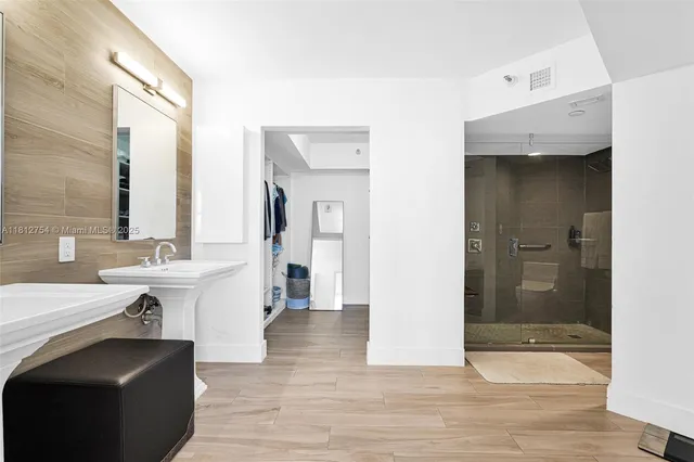 a view of a swimming pool with outdoor seating