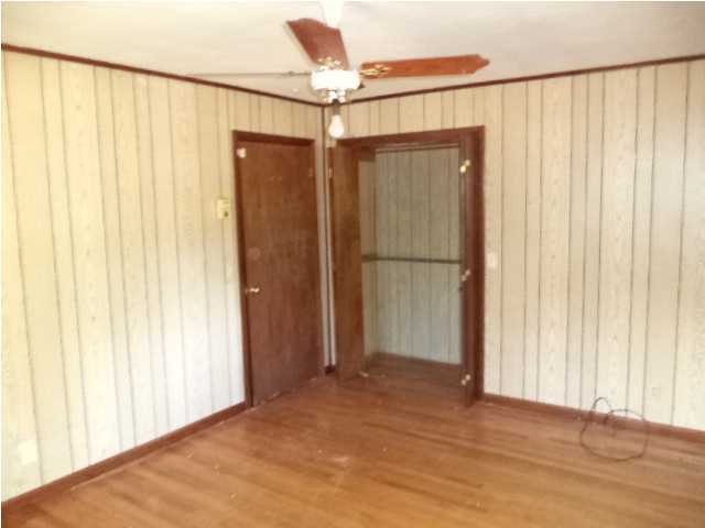 367 Cat Island Road DeFuniak Springs, FL 32433 - Photo 11 of 19 a view of a room with a wooden walls