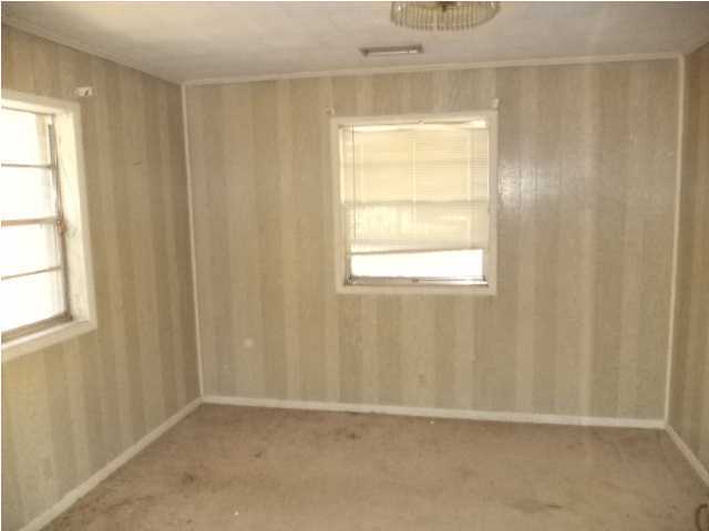367 Cat Island Road DeFuniak Springs, FL 32433 - Photo 8 of 19 a view of an empty room with a window