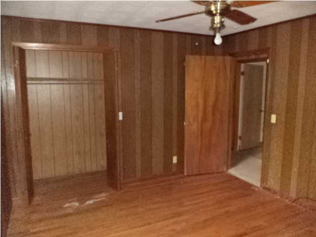367 Cat Island Road DeFuniak Springs, FL 32433 - Photo 9 of 19 a view of an empty room with a window