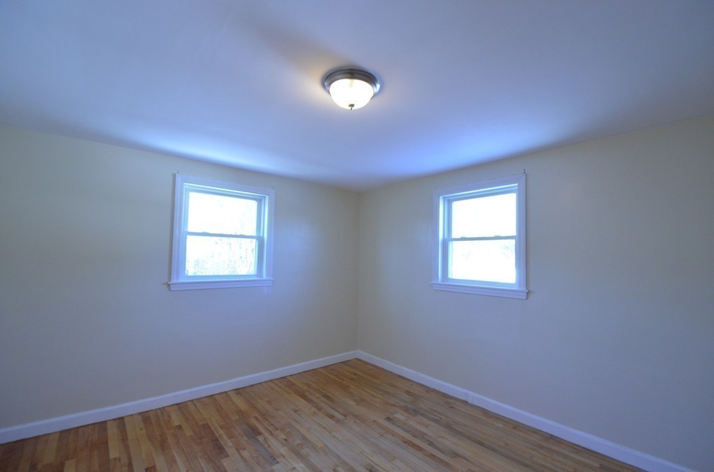 1239 Trapelo Road Waltham, MA 02451 - Photo 14 of 20 an empty room with a window