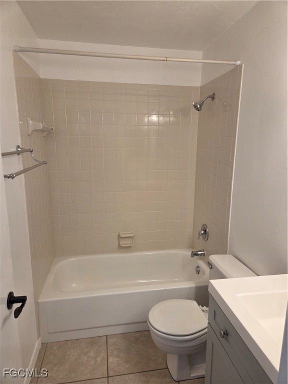 2780 Kings Lake Boulevard, Unit 203 Naples, FL 34112 - Photo 19 of 22 a bathroom with a sink a toilet and a bathtub