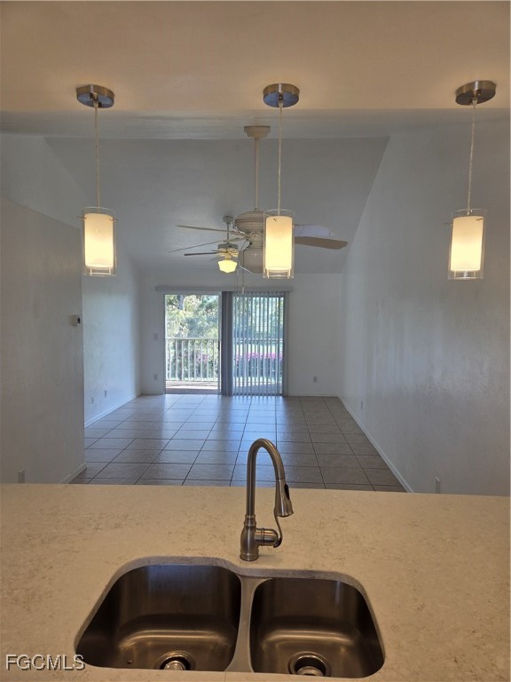 2780 Kings Lake Boulevard, Unit 203 Naples, FL 34112 - Photo 4 of 22 a kitchen with a sink and a window