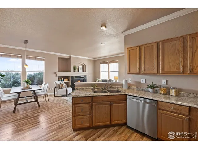 a kitchen with sink and cabinets
