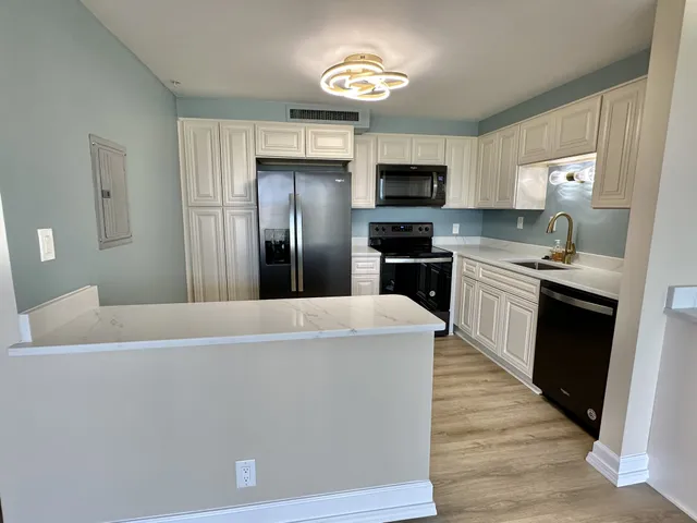 a view of a black and white checkered floor