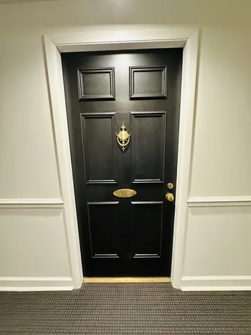a view of kitchen with wooden floor and staircase
