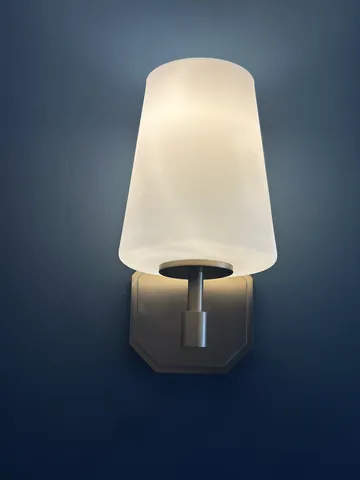 a view of hallway with wooden floor