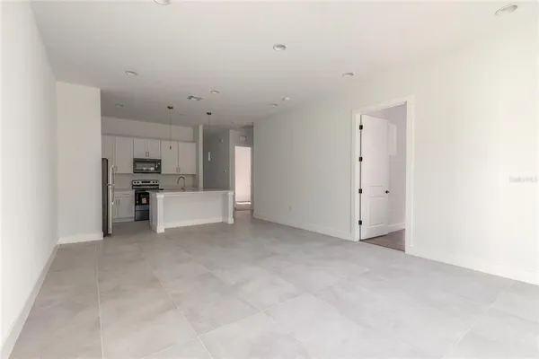 a bathroom with a sink a toilet a bathtub and mirror