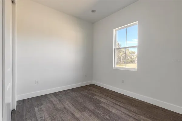 a kitchen with stainless steel appliances a refrigerator sink and microwave