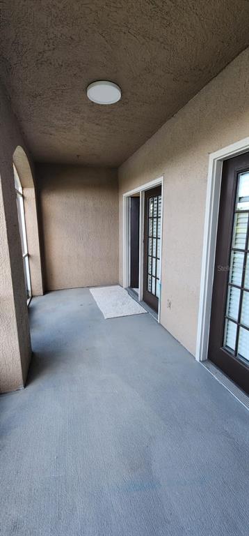 2015 Reston Road, Unit 2211 Orlando, FL 32837 - Photo 15 of 28 a view of an empty room with a window