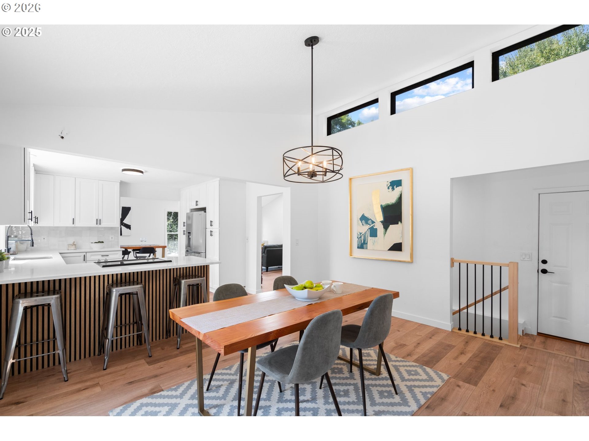 2 Falstaff Lake Oswego, OR 97035 - Photo 16 of 39 a dining room with a table chairs and a kitchen view