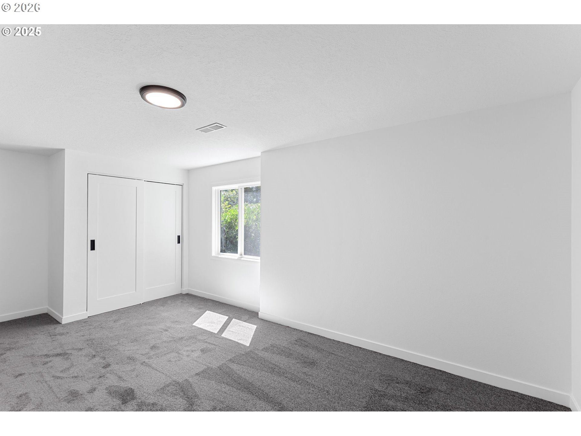 2 Falstaff Lake Oswego, OR 97035 - Photo 25 of 39 a view of an empty room with wooden floor and a window