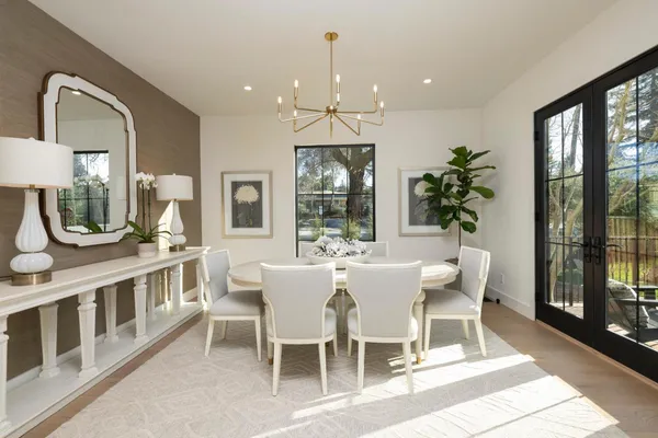 a view of a dining room with furniture window and outside view