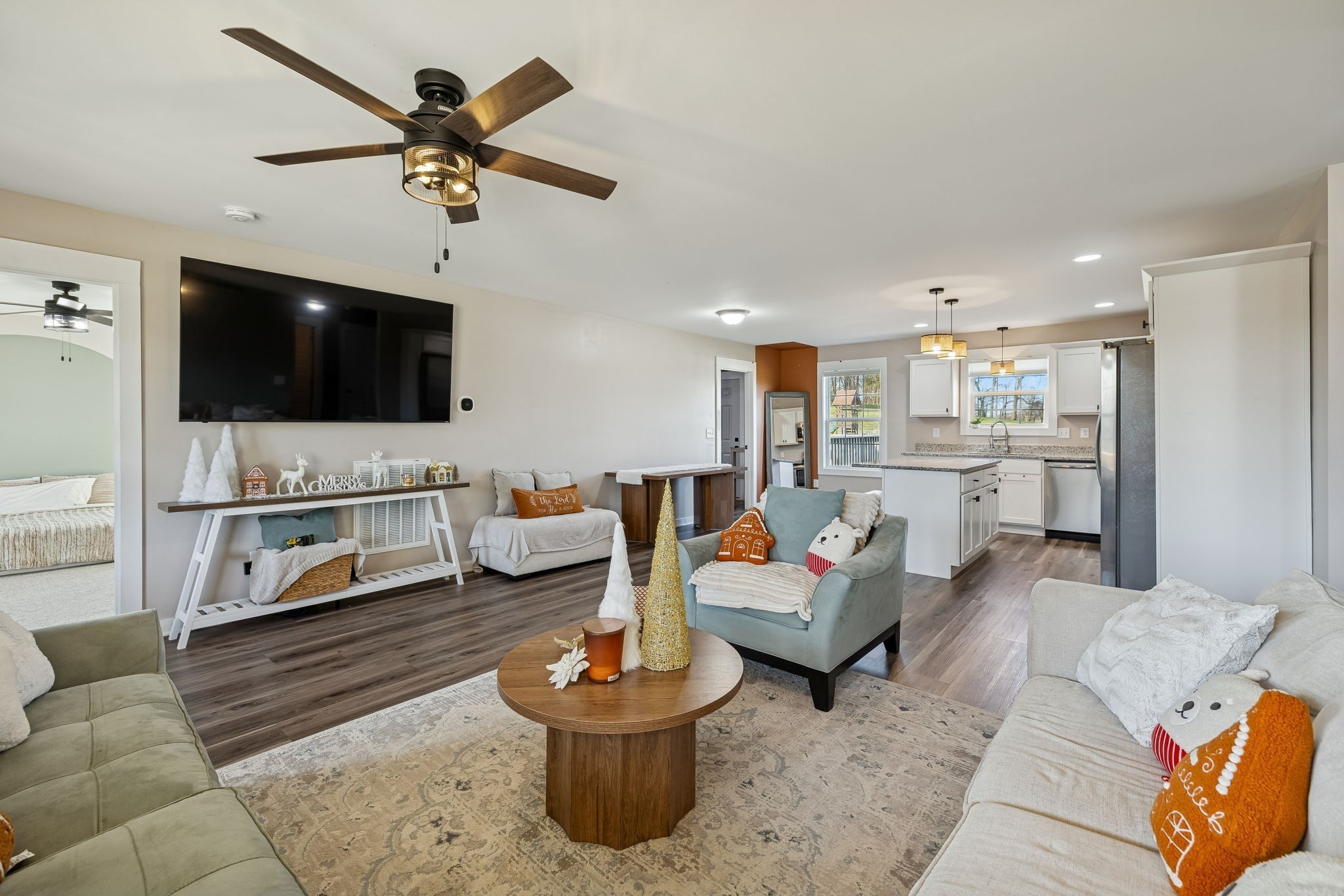 a living room with furniture and a flat screen tv