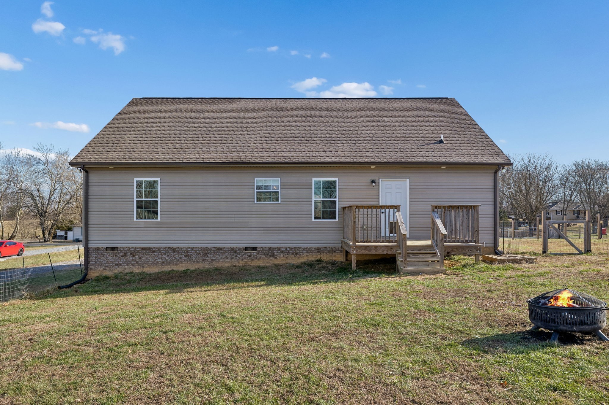 1521 Wixtown Road Westmoreland, TN 37186 - Photo 23 of 25 a front view of a house with a yard