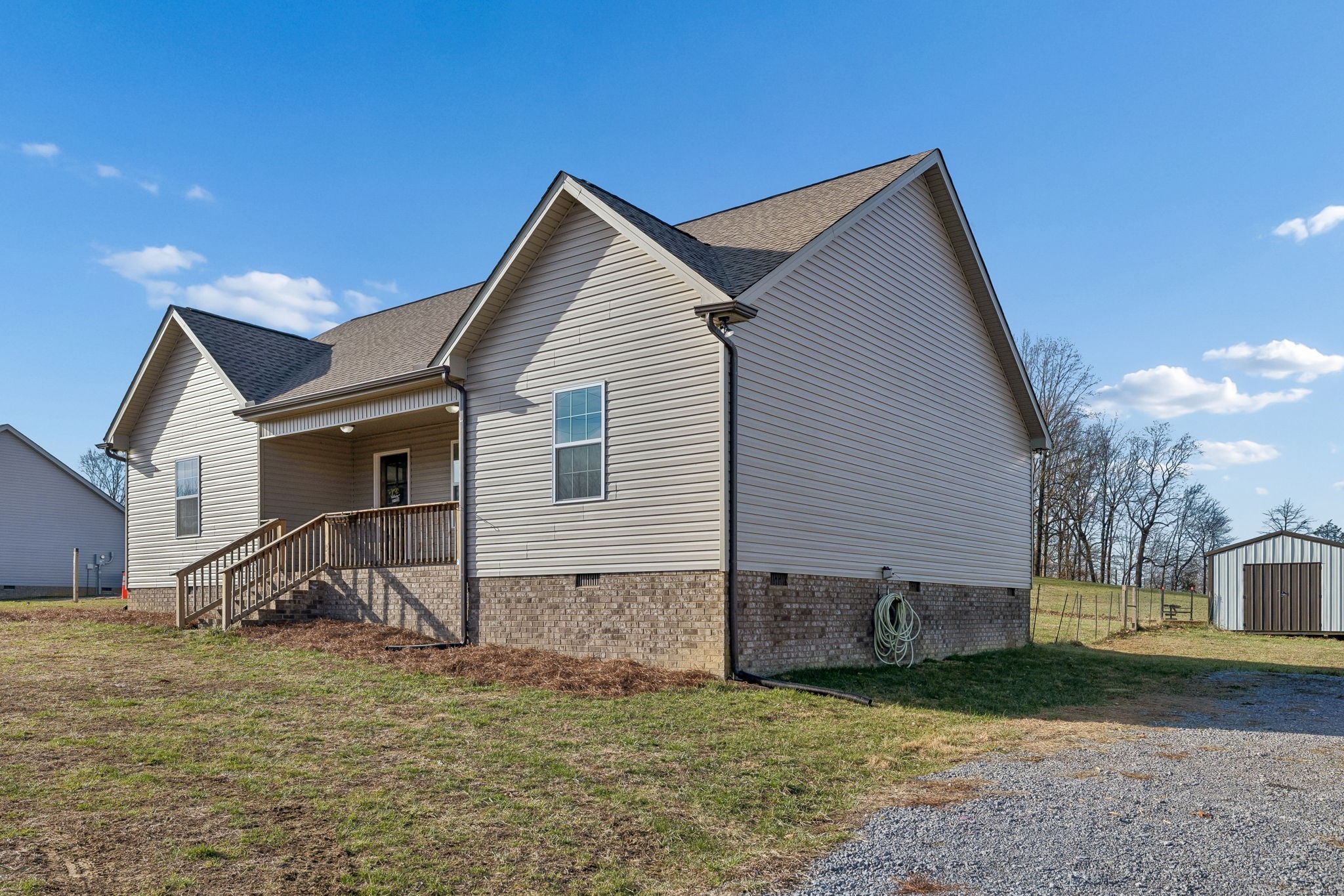 1521 Wixtown Road Westmoreland, TN 37186 - Photo 25 of 25 a view of a house with backyard